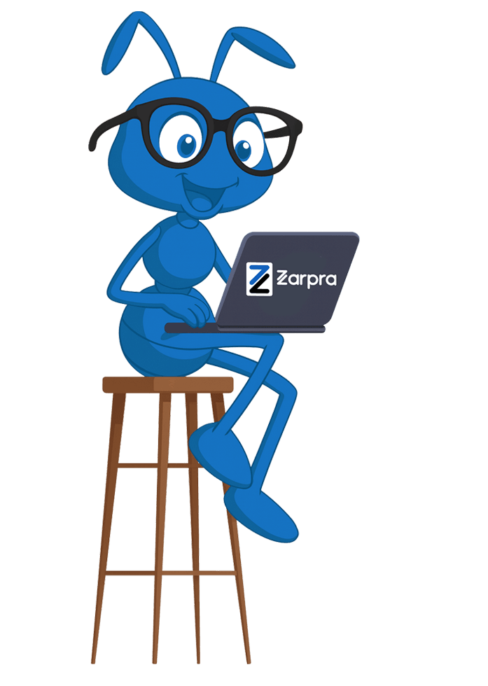 Zarpra ant on a stool typing on a Zarpra laptop